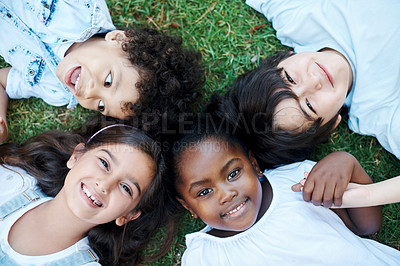 Buy stock photo Smile, circle and overhead portrait of children for outdoor nature,  garden together or field. Happy, diversity and top view of young kids relaxing and laying on lawn on grass or forest for summer