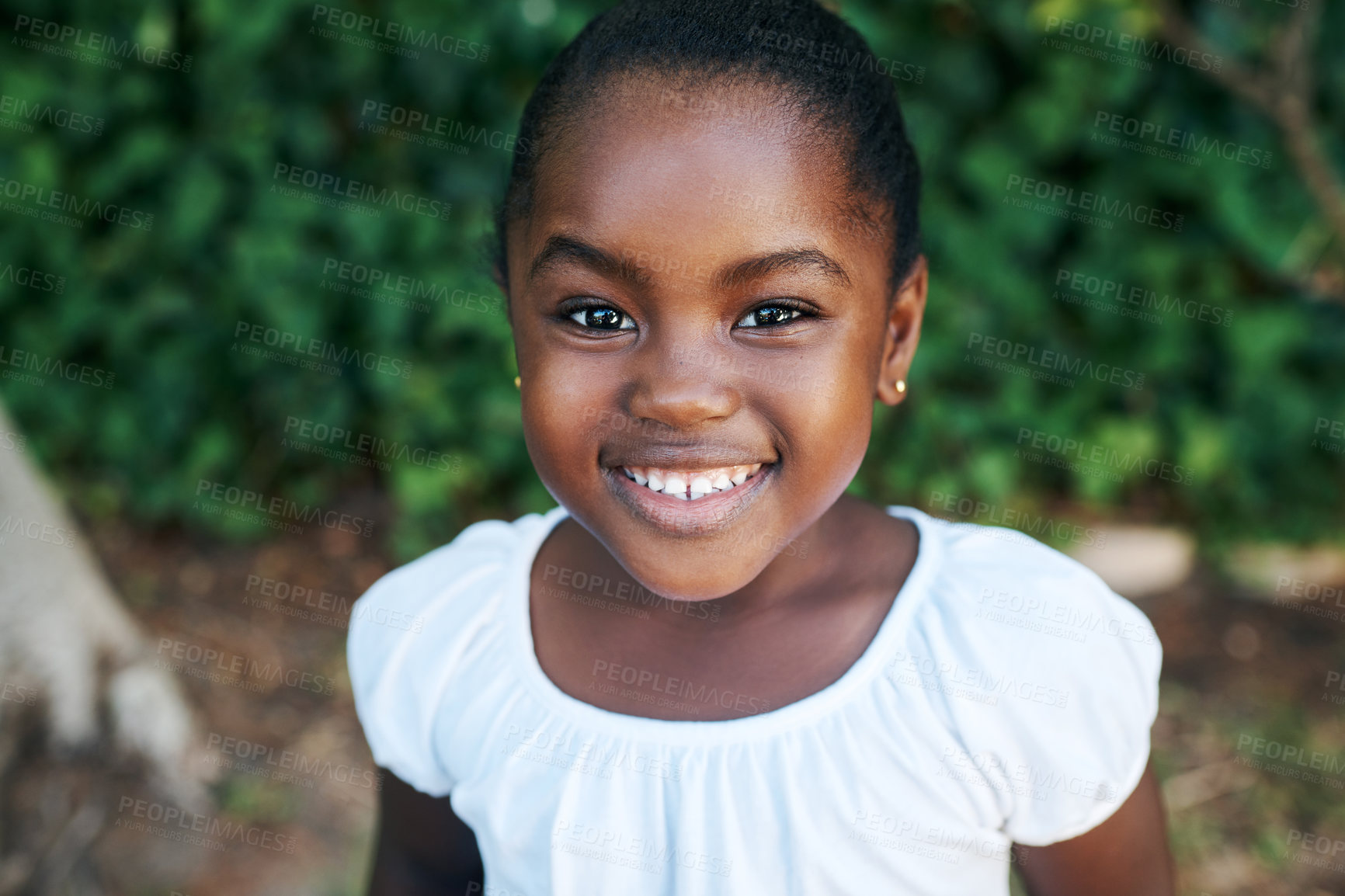 Buy stock photo Relax, smile and portrait of black child in garden for outdoor adventure, weekend and summer vacation. Kid, little girl and joyful in nature park for break, happiness and holiday fun in Nigeria