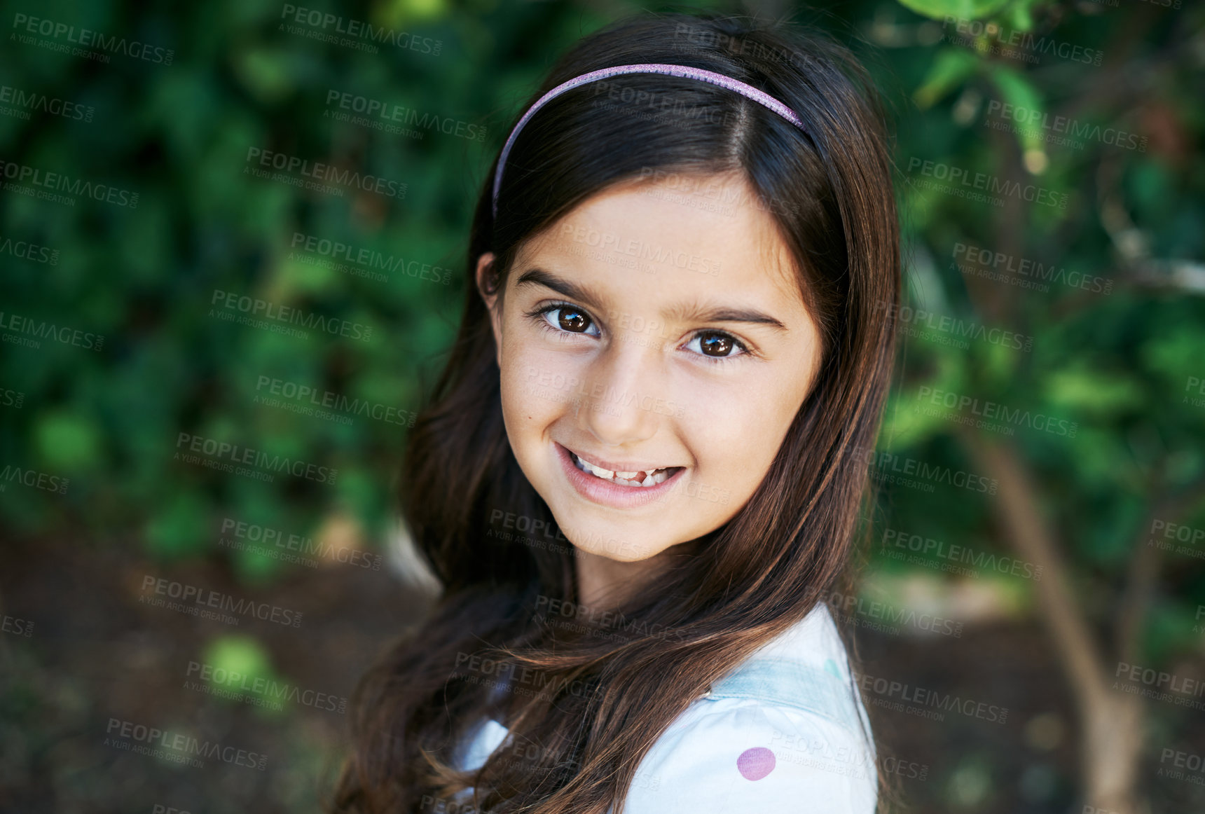 Buy stock photo Happy, smile and portrait of kid in backyard for outdoor adventure, holiday and summer vacation. Childhood, little girl and relax in nature for weekend break, happiness and fun in green garden