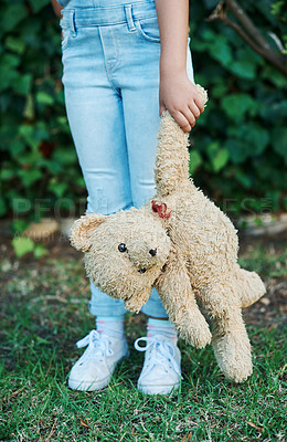 Buy stock photo Child, kid and legs and teddy bear or sad in garden park or lost alone, abandoned or playground. Depression, unhappy and kindergarten student on backyard grass or disappointed, adoption or lonely