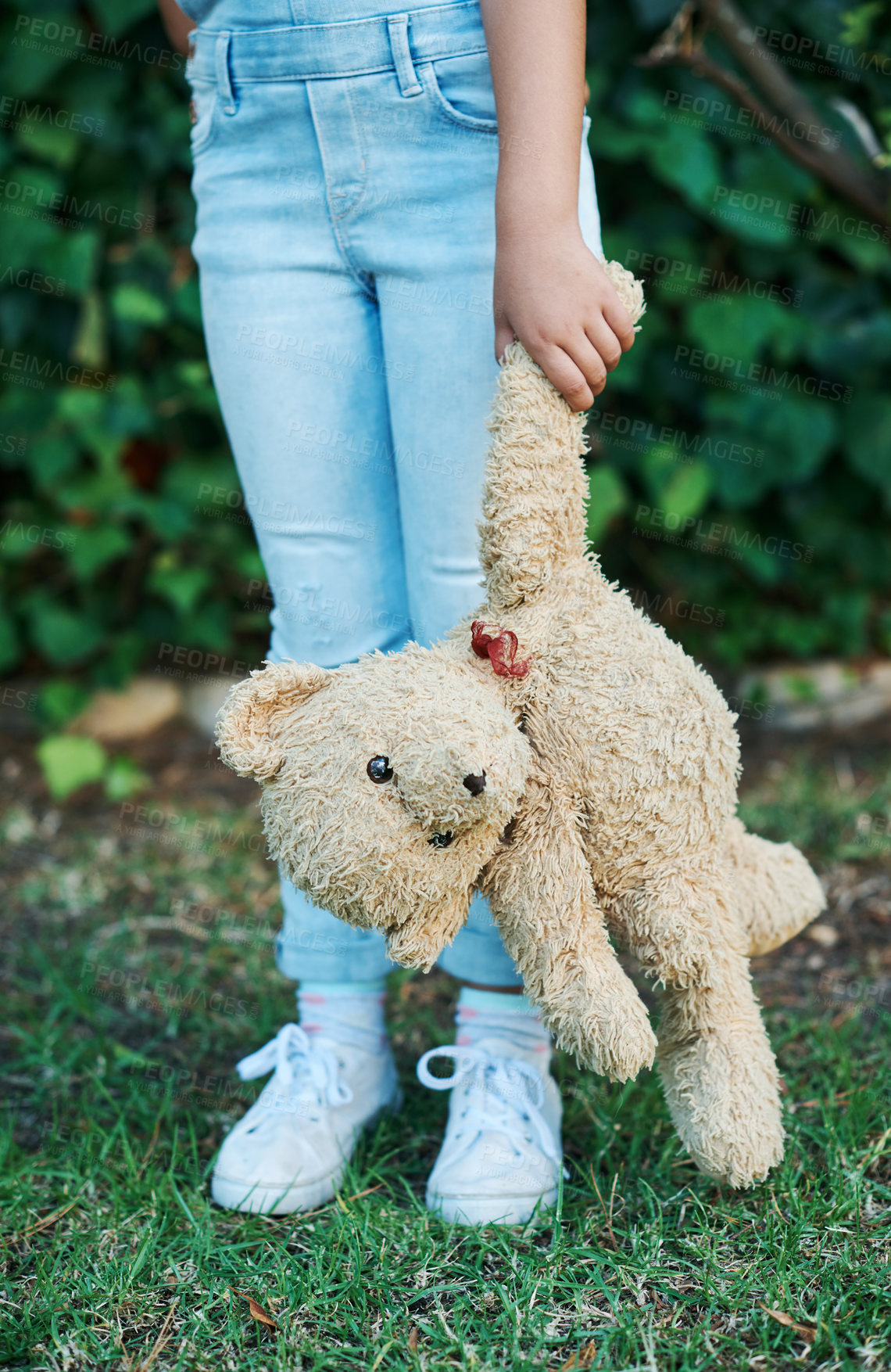 Buy stock photo Child, kid and legs and teddy bear or sad in garden park or lost alone, abandoned or playground. Depression, unhappy and kindergarten student on backyard grass or disappointed, adoption or lonely