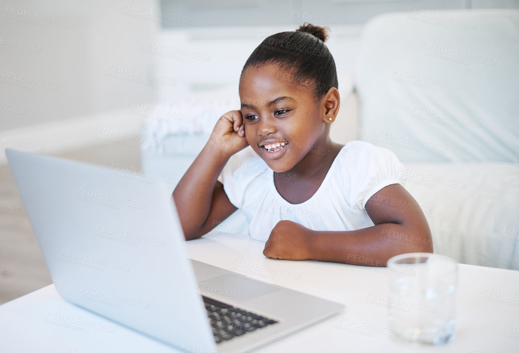 Buy stock photo Laptop, elearning and black child by desk in home for development, homework and knowledge. Technology, smile and girl student in virtual class with computer for online distance education at house.