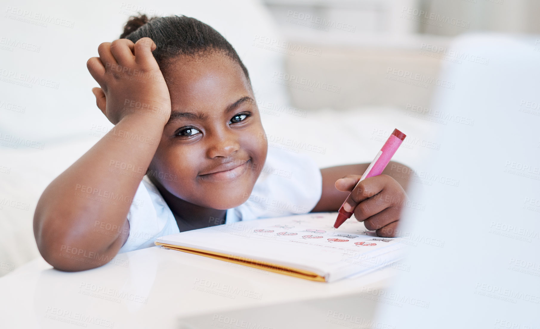 Buy stock photo Drawing, smile and portrait of child by desk in home for development, homework and knowledge. Creative, writing and girl kid student with pencils for assignment, project or school test at house.