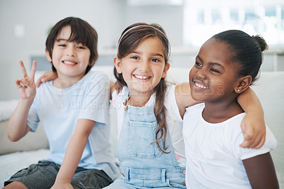 Buy stock photo Shot of a group of little children smiling at home