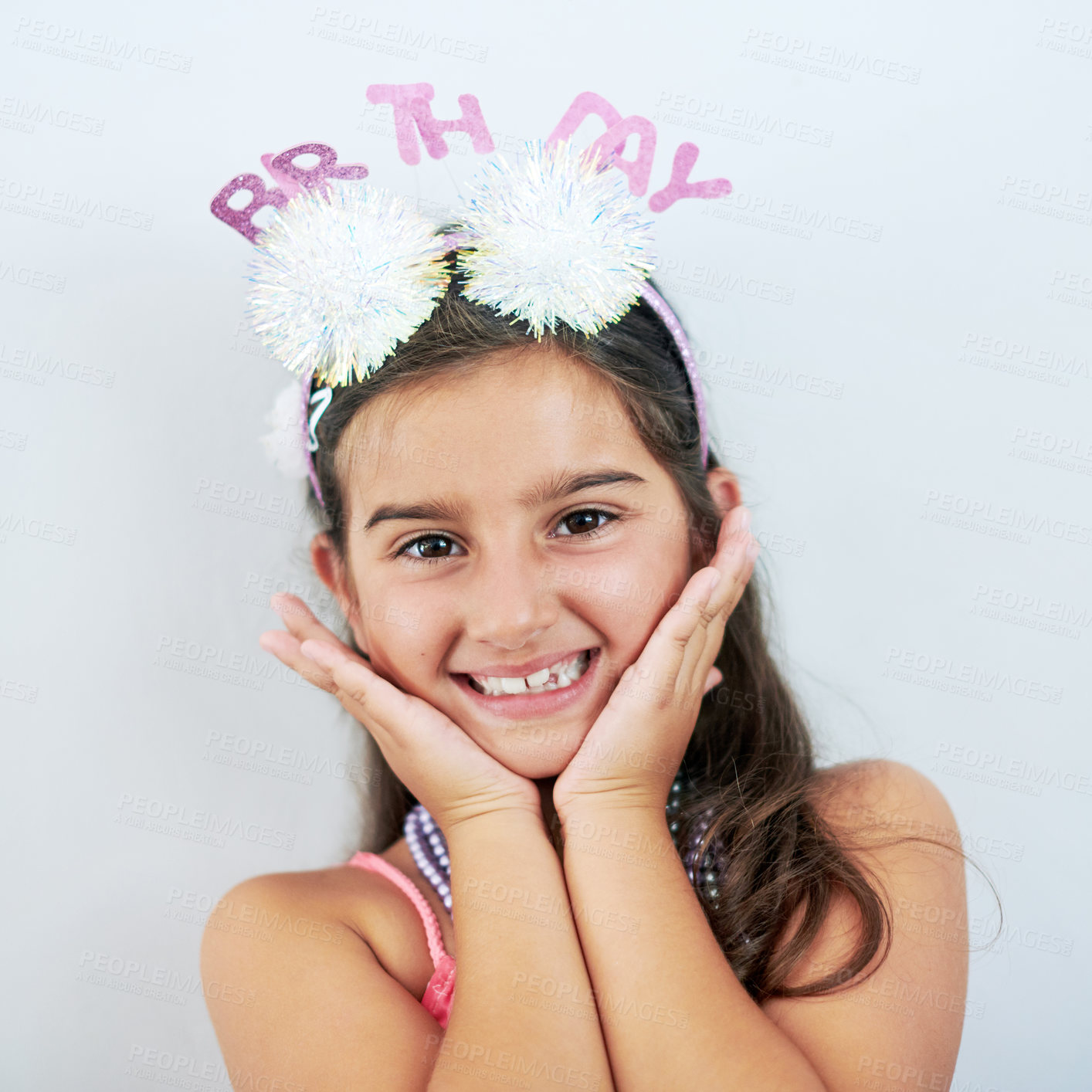 Buy stock photo Girl, birthday and portrait in house with excited for celebration with happy smile for party. Child, head band and special day with facial expression of joy, memories and getting older in America.