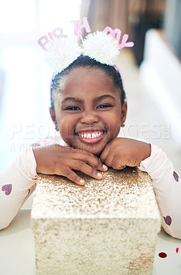 Buy stock photo Small girl, portrait and gift in house for birthday, surprise and summer memory at fun party. Black child, happiness and present in box at home living room for social children event and celebration