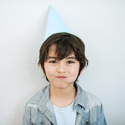 Buy stock photo Boy, portrait and hat in house for birthday, surprise and summer memory at fun party with smile. Happy child, face and white background at home living room for social children event and celebration