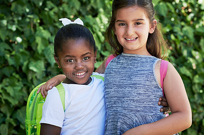 Buy stock photo Shot of two little girls wearing backpacks outside in nature