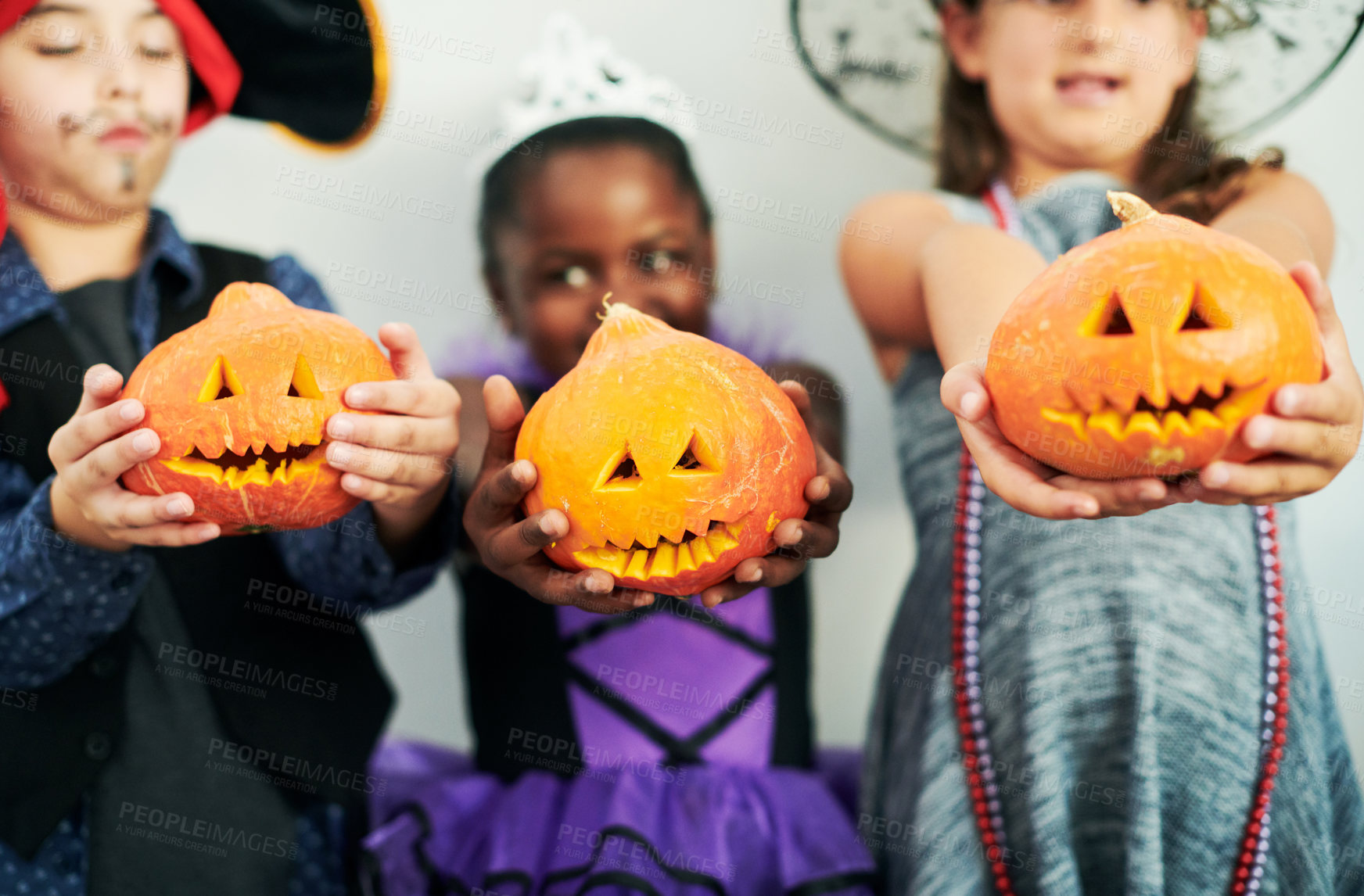 Buy stock photo Halloween, pumpkin and children in studio with costume for fantasy, birthday party and happiness. Orange vegetable, jack-o-lantern and young kids with creative fashion and smile by white background