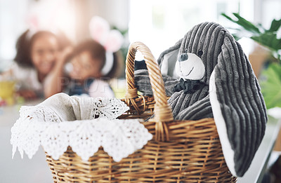 Buy stock photo Shot of a toy rabbit in a basket at home