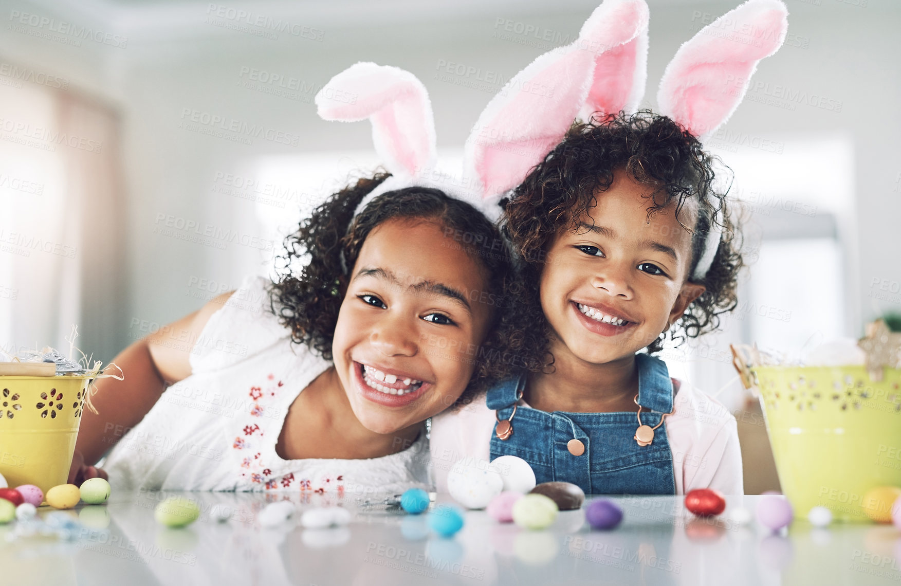 Buy stock photo Shot of two sisters playing together at home