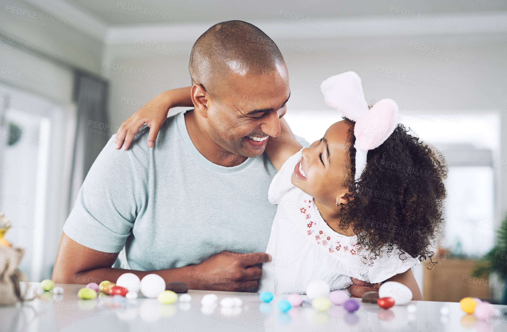 Buy stock photo Shot of a father spending time with his daughter at home