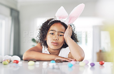 Buy stock photo Shot of a unhappy girl sitting at home