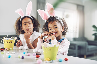 Buy stock photo Shot of two sisters playing together at home