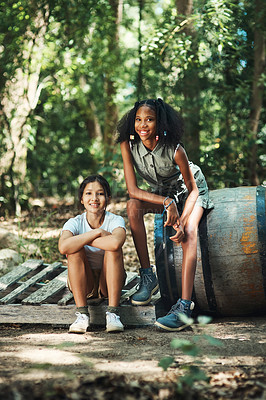 Buy stock photo Shot of two teenage girls having fun in nature at summer camp