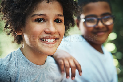 Buy stock photo Shot of two teenage boys exploring nature at summer camp