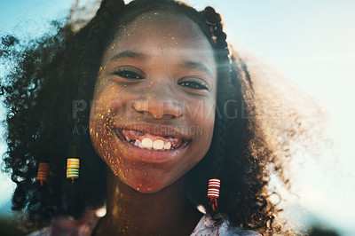 Buy stock photo Shot of a teenage girl having fun with colourful powder at summer camp