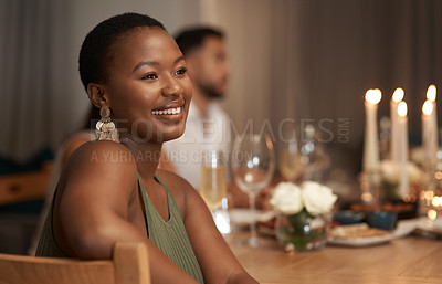 Buy stock photo Dinner, party and thinking with a black woman at a table in celebration of the new year or a birthday. Event, idea and social with a young female sitting in a home or house for the festive season