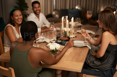 Buy stock photo Dinner, party and champagne toast with friends celebrating new year. Social event, celebration and happy group of people with wine glasses having fun, laughing and enjoying holiday time together.