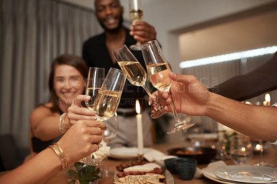 Buy stock photo Dinner party, friends and cheers with wine glass for celebration, social gathering or new years event at home. Happy group of people toast alcohol, champagne and drinks to celebrate together at night