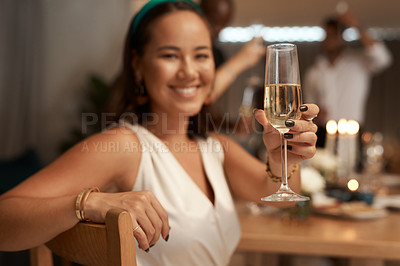 Buy stock photo Woman, champagne and hand for toast in portrait, dinner or party for new year with friends, family or team. Happy celebration, sparkling wine or smile at supper for food, drinks or blurred background