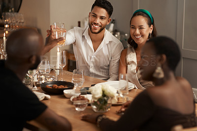 Buy stock photo Wine, toast and party with friends at table of dining room for new year celebration, festive and social gathering. Drink, dinner and cheers with group of people at home for reunion, holiday and event