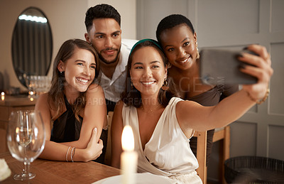 Buy stock photo Group of friends, smartphone for selfie and party for celebration, happiness and bonding for New Years. Young people, diversity and phone for social media, connection and dinner to relax and smile.