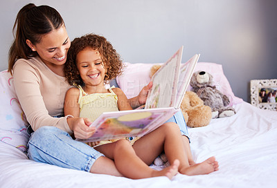 Buy stock photo Smile, book and mother with daughter in bedroom for storytelling, fantasy or creative. Education, learning and love with woman reading to young girl in family home for fairytale, literature and relax