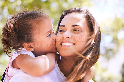 Buy stock photo Mother, child and kiss in nature, piggyback or bonding on happy summer holiday. Mom, ride and girl kissing cheek, love and affection, care and enjoying quality family time together in outdoor park.