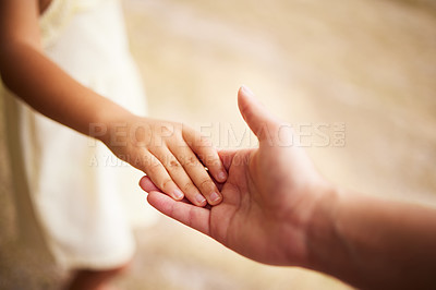 Buy stock photo Love, closeup with person with their child and holding hands for support. Care with happy family, help or trust and parent hold her kids hand for compassion or calm with mockup space together