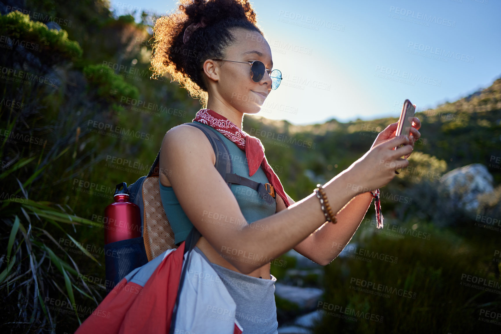 Buy stock photo Travel, sunglasses and woman with smartphone in nature for hiking route, gps navigation, or direction. Smile, mobile phone and female person with eyewear for adventure, sightseeing or explore outdoor