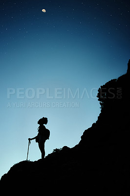 Buy stock photo Person, silhouette and hiking at night with trekking stick for explore mountain, adventure or challenge. Hill, rocks and climber workout for early morning cardio as athlete in forest, fit or dark