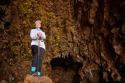 Buy stock photo Shot of a mature woman hiking in nature