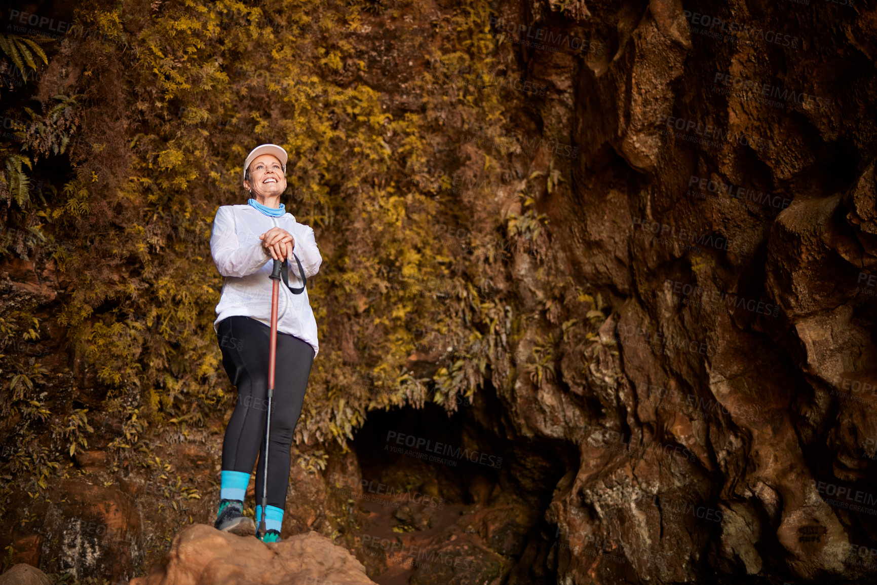 Buy stock photo Shot of a mature woman hiking in nature