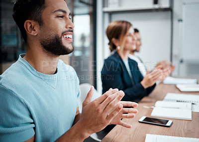 Buy stock photo Shot of a group of coworkers clapping during a business meeting