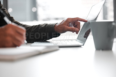 Buy stock photo Hands, laptop and writing with business person at desk in office for information, planning or research. Diary, journal or notebook for agenda, calendar or schedule with employee in workplace closeup