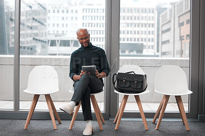 Buy stock photo Business man, tablet and chair in waiting room, queue and opportunity of job interview, recruitment process or human resources. Black male, digital technology and browsing internet in line for hiring