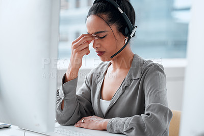 Buy stock photo Call center, stress and woman consultant in office for online crm consultation or enquiries. Telemarketing, headache and female technical support or customer service agent with desktop in workplace.