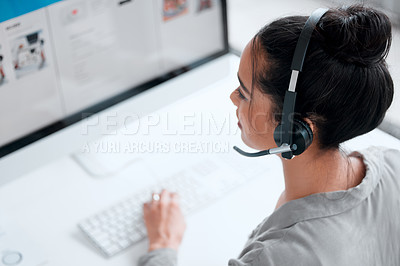Buy stock photo Shot of a young female call center worker