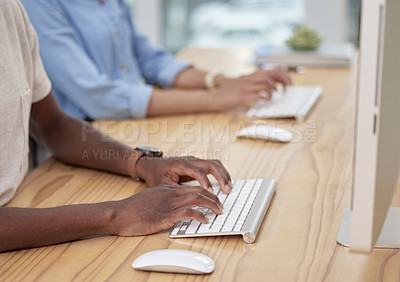 Buy stock photo Colleagues, closeup or desk at office with typing for email, internet or research with computer. People, work and table in company with keyboard for communication, online or connected for web design
