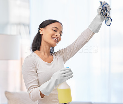 Buy stock photo Bottle, singing and woman in home for spring cleaning or housework for daily routine, hygiene and housekeeping. Girl, happy and chemical detergent with cloth for disinfecting and house maintenance