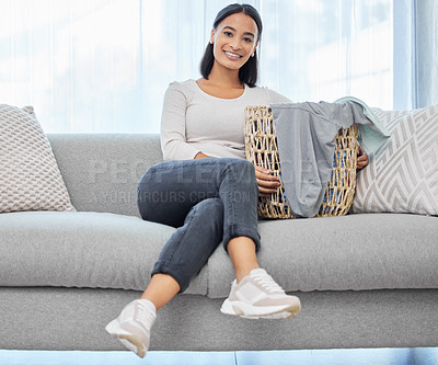 Buy stock photo Couch, laundry and portrait of woman with basket for house work, cleaning service and weekend maintenance. Female cleaner, sofa and smile in living room with container for clothes, fabric and hygiene
