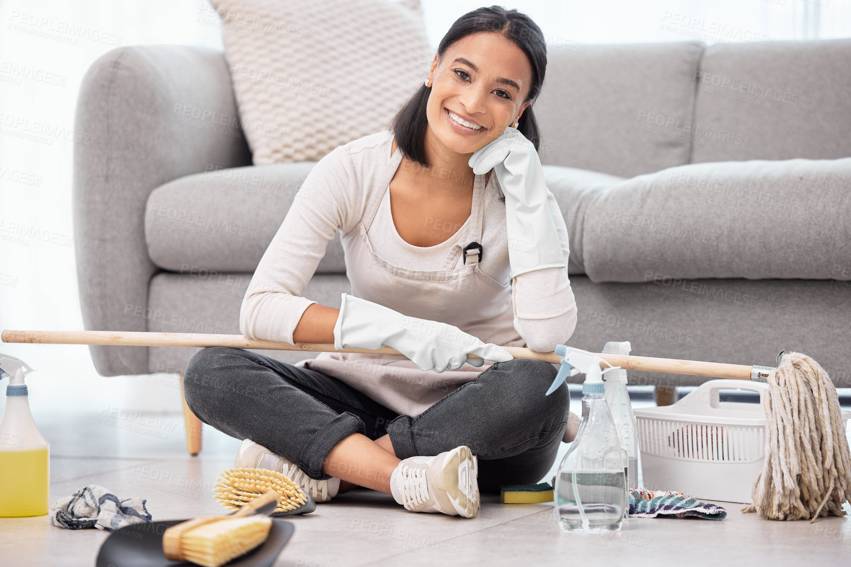 Buy stock photo Cleaning, portrait and woman in home relax for housework, housekeeping and domestic chores for daily routine. Girl, happy and detergent or supplies for house maintenance, living room and disinfecting