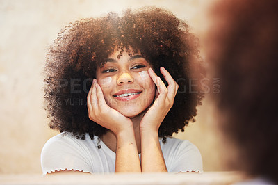 Buy stock photo Beauty, face and lotion with black woman in mirror of bathroom for morning dermatology routine. Cream, skincare and smile with happy afro person in apartment to apply moisturizer cream for hydration
