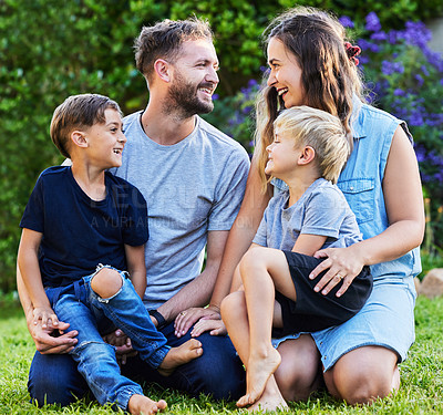 Buy stock photo Backyard, mother and father with kids in together as family outdoor for bonding, happy and laughing. Parents, children and hug with boys in garden at home for connection, love and support in park