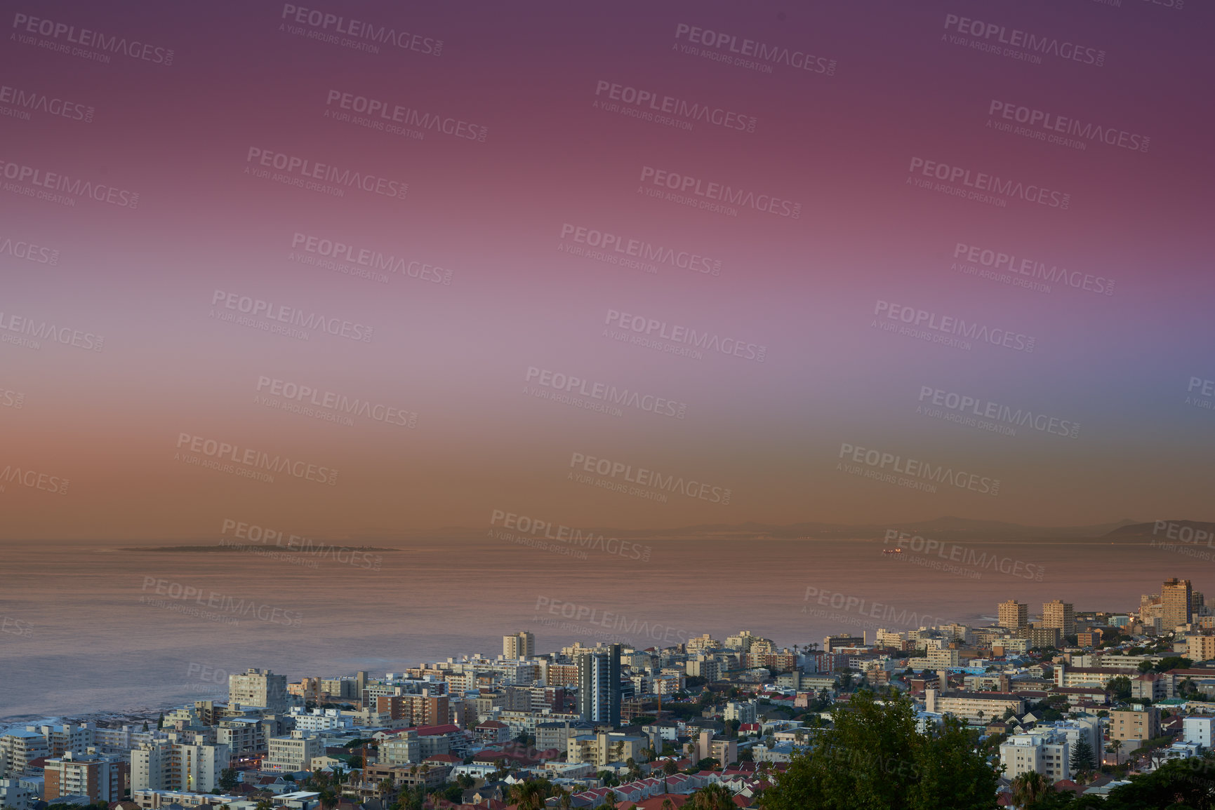 Buy stock photo Copy space sunset sky and city view of building infrastructure with sea or ocean background in abroad travel destination. Aerial of Cape Town downtown centre and urban cityscape architecture at night