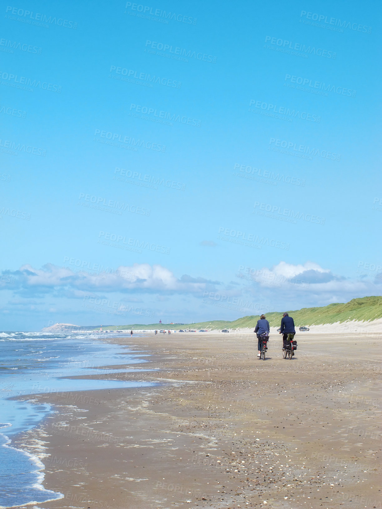 Buy stock photo A photo of people at the beachBeach, sunshine and clouds