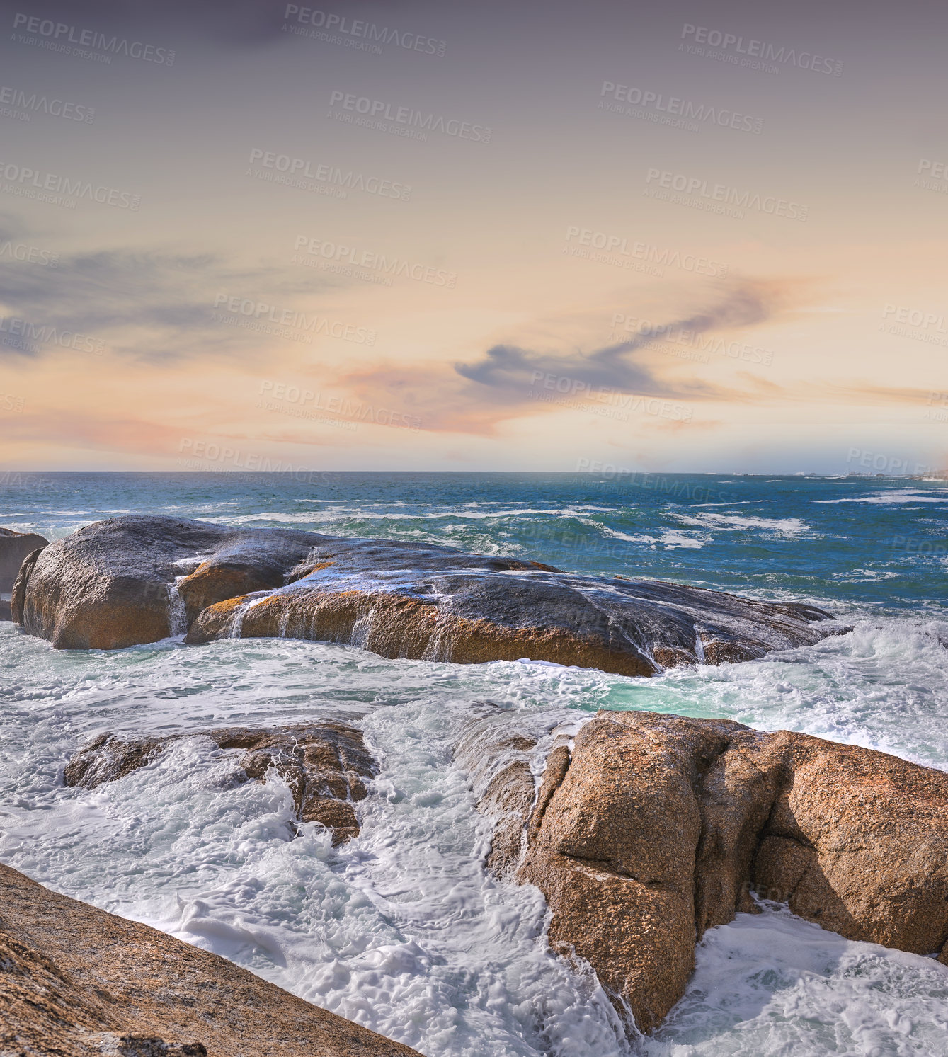 Buy stock photo Beautiful, blue ocean view of a sea with a light, colorful sky copy space. Outdoor landscape of rocks and waves in nature on a summer beach day. Relaxing coastal setting outside with the sun shining