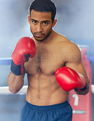 Buy stock photo Man, portrait and boxer with gloves in ring for training, workout and practice for fighting competition. Boxing, pro champion and serious with sport for self defense, topless and healthy body in gym