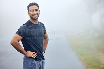 Buy stock photo Portrait, fog and man outdoor for exercise with runner in nature for cardio, health and wellness. Fitness, workout and run on a misty morning in park, training for marathon or race with confidence